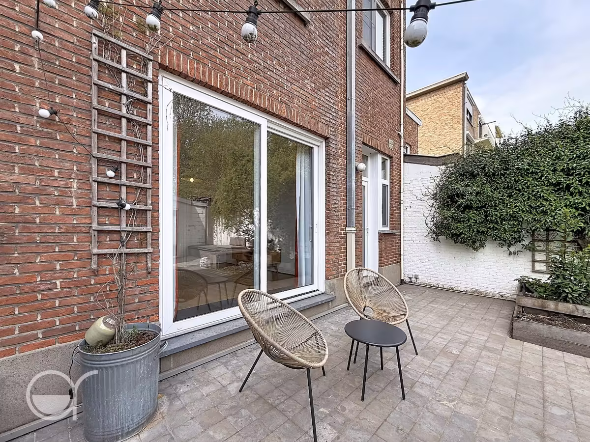 Ruim gelijkvloers 1-slaapkamerappartement met stadstuintje en garagebox - 13