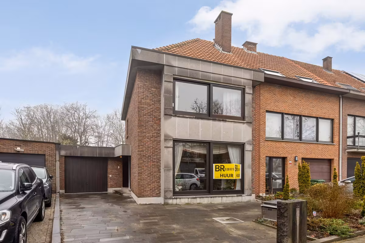 Halfopen bebouwing met zonnige tuin en garage - 2