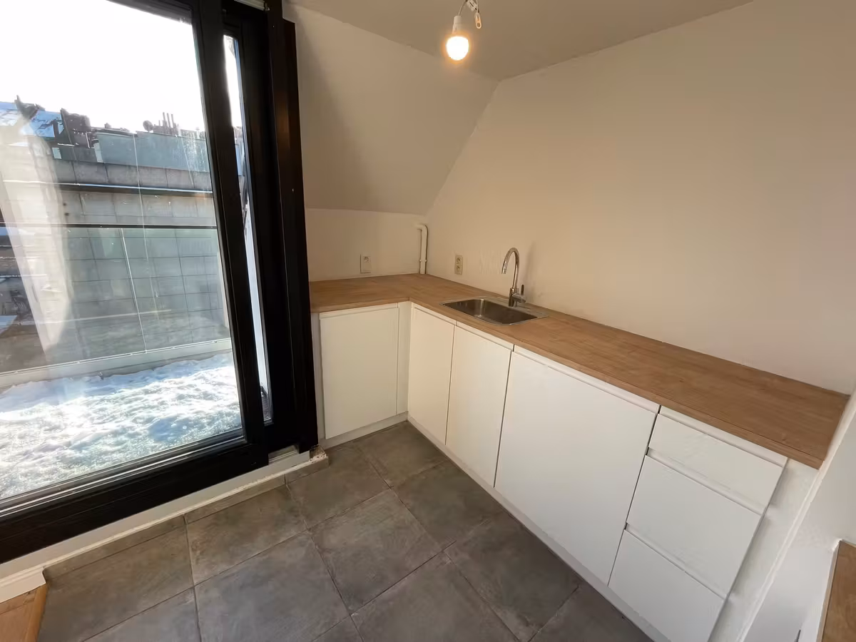 Lichtrijk duplex met terras in Ganshoren - 11