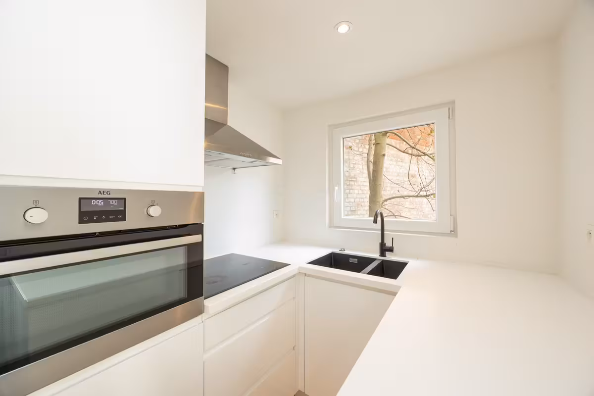 APPARTEMENT MET TUIN - 12