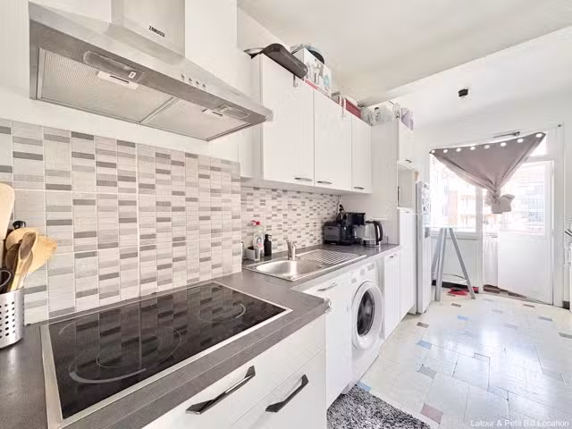 Twee-slaapkamerappartement met garage - 2