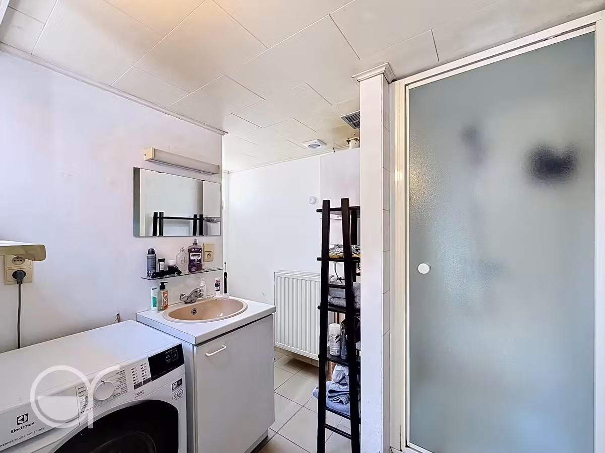Rijwoning met 2 slaapkamers en zonnig stadstuintje in centrum Drongen - 6