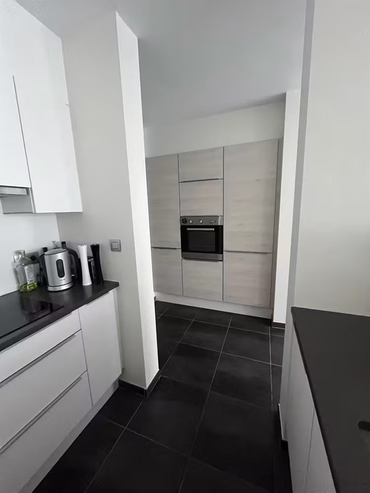 Ruim appartement met 2 slaapkamers op de Belgiëlei - 3
