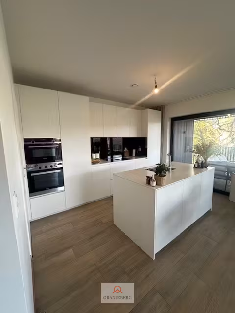 Modern appartement met staanplaats in groene parktuin - 12