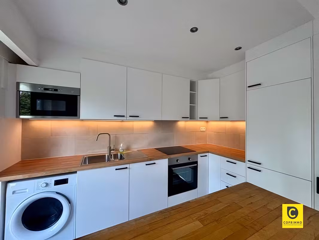Charmant 2-slaapkamerappartement met terras en garagebox te Berchem - 7