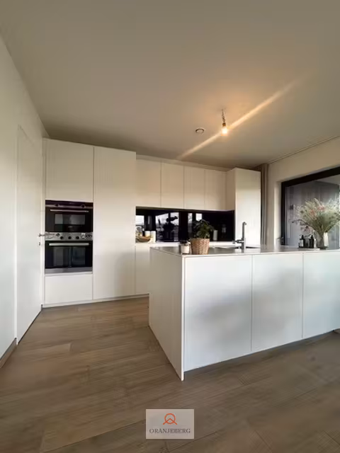 Modern appartement met staanplaats in groene parktuin - 13