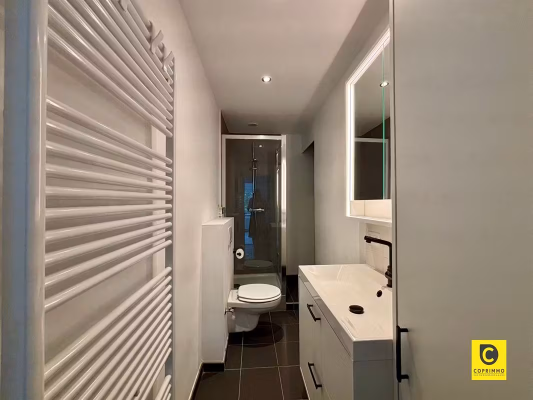 Charmant 2-slaapkamerappartement met terras en garagebox te Berchem - 14