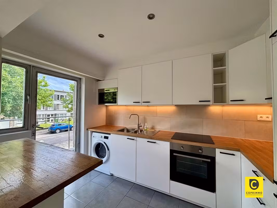 Charmant 2-slaapkamerappartement met terras en garagebox te Berchem - 6