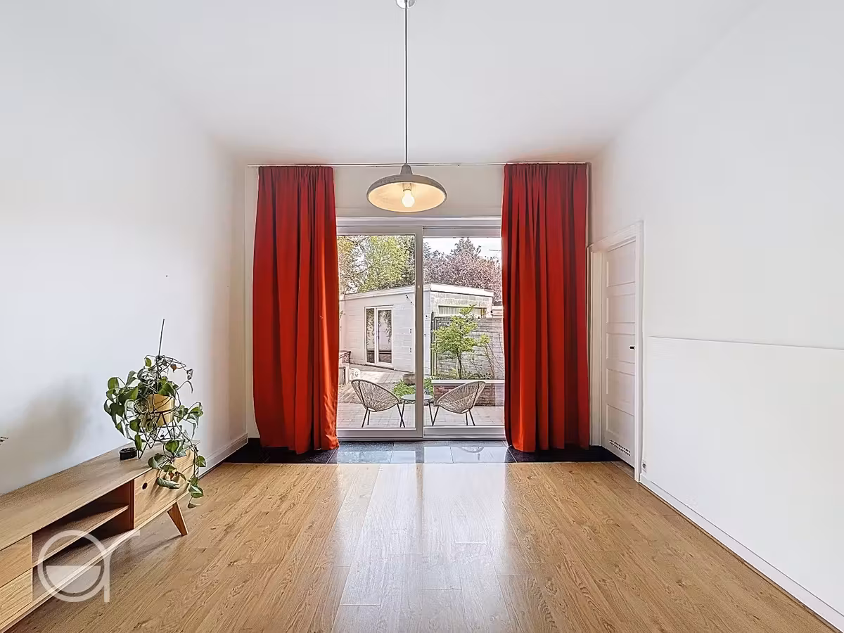 Ruim gelijkvloers 1-slaapkamerappartement met stadstuintje en garagebox - 7