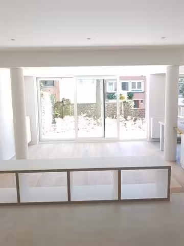 Rez-de-chaussée avec jardin à Uccle