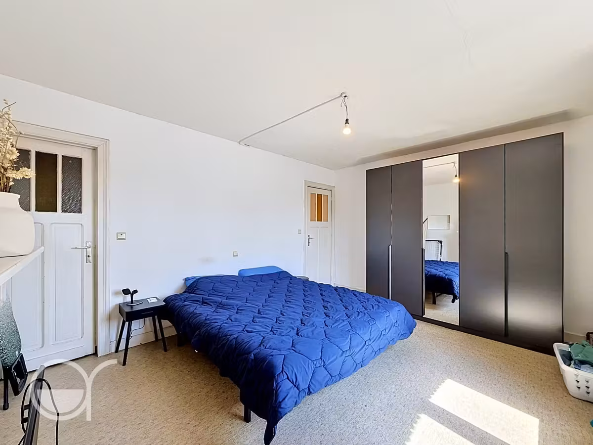 Rijwoning met 2 slaapkamers en zonnig stadstuintje in centrum Drongen - 12
