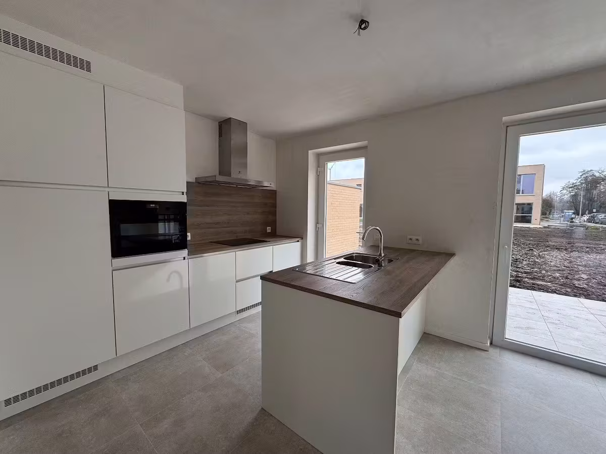 Moderne en energiezuinige halfopen woning met tuin op topligging in Mariakerke - 5